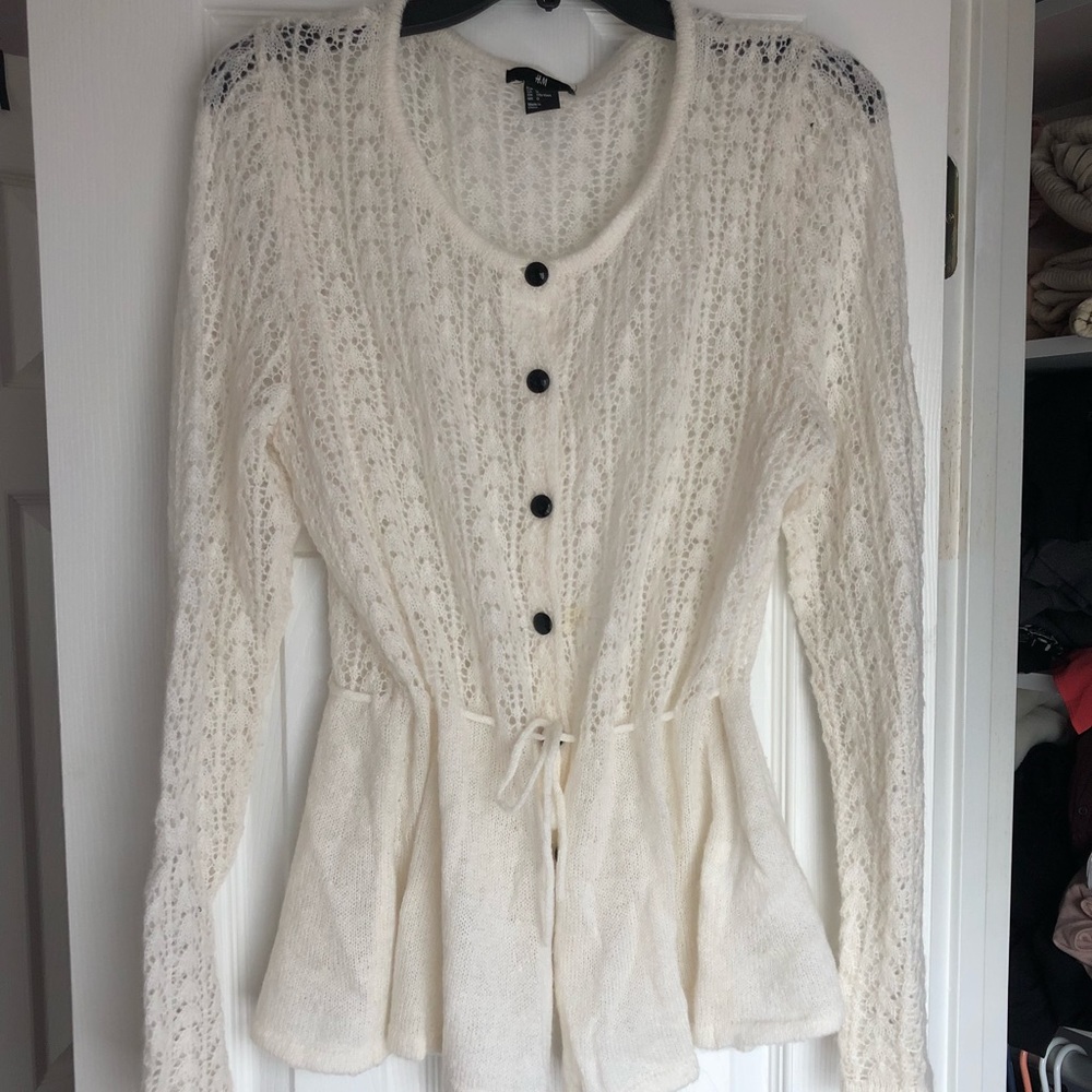 Button up knitted peplum style cardigan sweater